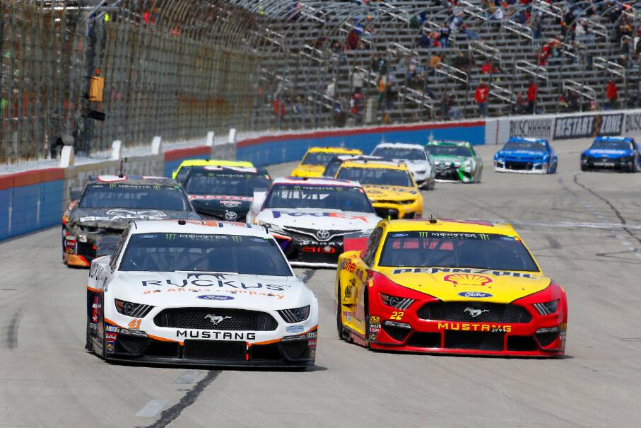 But a hood brace collapsed, causing Logano (22) to lose a lap due to repairs. But a hood brace collapsed, causing Logano (22) to lose a lap due to repairs.